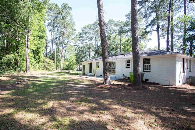 4513 Bonnie Forest Blvd, Columbia, SC 29210 - back of house featuring brick siding, a patio, and crawl space