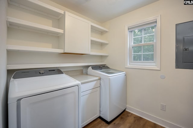67 Ole Still Ln, Elgin, SC 29045 - laundry room with electric panel, cabinet space, independent washer and dryer, dark wood-type flooring, and baseboards