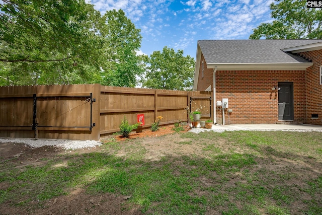 67 Ole Still Ln, Elgin, SC 29045 - fenced backyard with a gate and a patio area
