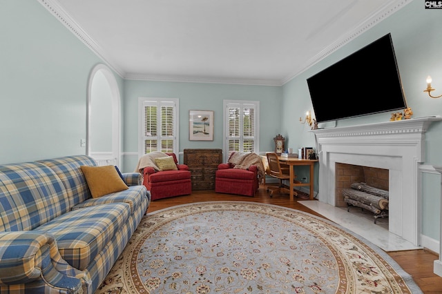 6148 Marthas Glen Rd, Columbia, SC 29209 - living room featuring a fireplace with flush hearth, ornamental molding, and wood finished floors