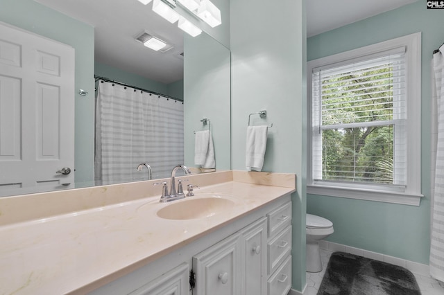 6148 Marthas Glen Rd, Columbia, SC 29209 - bathroom with vanity, toilet, tile patterned floors, baseboards, and a shower with shower curtain