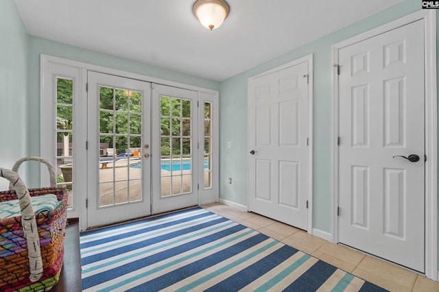 6148 Marthas Glen Rd, Columbia, SC 29209 - doorway to outside featuring french doors, light tile patterned floors, and baseboards