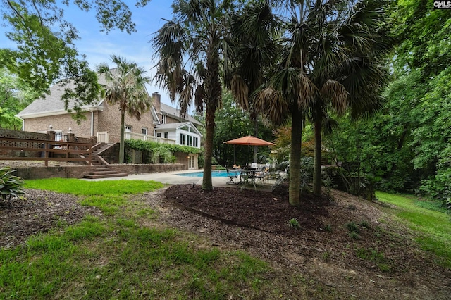 6148 Marthas Glen Rd, Columbia, SC 29209 - view of yard with an outdoor pool, a patio, and stairs