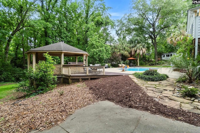 6148 Marthas Glen Rd, Columbia, SC 29209 - view of yard with a gazebo, an outdoor pool, a wooden deck, and view of scattered trees