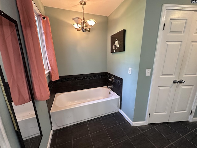 109 Cranewater Dr, Columbia, SC 29212 - full bathroom with tile patterned flooring, a bath, a chandelier, and baseboards
