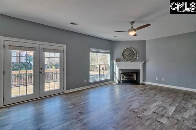 2 Alverston Ct, Irmo, SC 29063 - unfurnished living room featuring french doors, a ceiling fan, wood finished floors, a fireplace with flush hearth, and baseboards