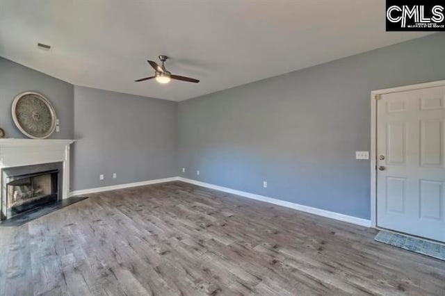 2 Alverston Ct, Irmo, SC 29063 - unfurnished living room with ceiling fan, wood finished floors, baseboards, and a fireplace