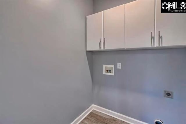2 Alverston Ct, Irmo, SC 29063 - laundry area featuring cabinet space, washer hookup, baseboards, electric dryer hookup, and wood finished floors