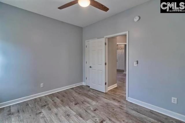 2 Alverston Ct, Irmo, SC 29063 - empty room featuring a ceiling fan, wood finished floors, baseboards, and a smoke detector