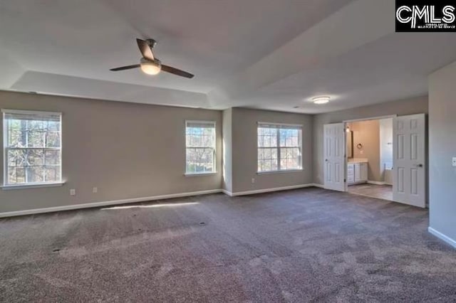 2 Alverston Ct, Irmo, SC 29063 - unfurnished bedroom with baseboards, carpet, a tray ceiling, ensuite bath, and a ceiling fan