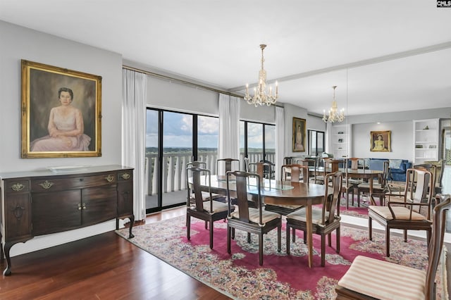 1829 Senate St Unit 11-A, Columbia, SC 29201 - dining area with a chandelier and dark wood-style floors