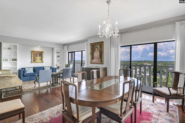 1829 Senate St Unit 11-A, Columbia, SC 29201 - dining area with wood finished floors, built in features, and a chandelier