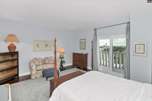 1829 Senate St Unit 11-A, Columbia, SC 29201 - bedroom featuring access to exterior, baseboards, and wood finished floors