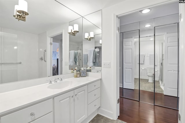 1829 Senate St Unit 11-A, Columbia, SC 29201 - bathroom with vanity, toilet, and baseboards