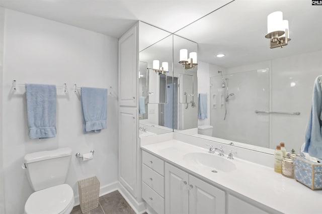 1829 Senate St Unit 11-A, Columbia, SC 29201 - bathroom with toilet, an enclosed shower, baseboards, and vanity