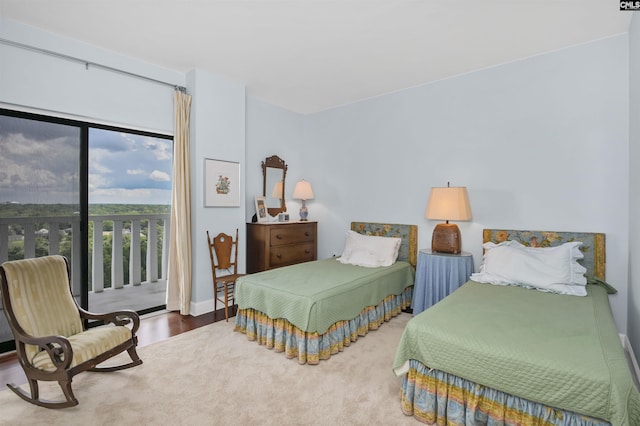 1829 Senate St Unit 11-A, Columbia, SC 29201 - bedroom featuring access to outside and wood finished floors