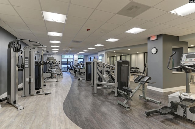 1829 Senate St Unit 11-A, Columbia, SC 29201 - exercise room featuring baseboards and wood finished floors