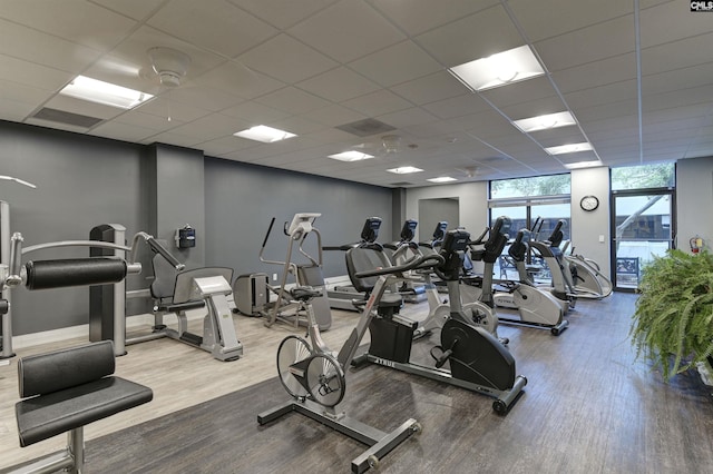 1829 Senate St Unit 11-A, Columbia, SC 29201 - workout area featuring wood finished floors, baseboards, and a paneled ceiling