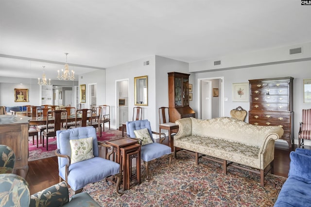 1829 Senate St Unit 11-A, Columbia, SC 29201 - living room featuring a chandelier and wood finished floors