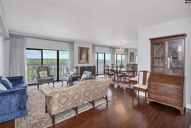1829 Senate St Unit 11-A, Columbia, SC 29201 - living room featuring dark wood-style floors and a chandelier
