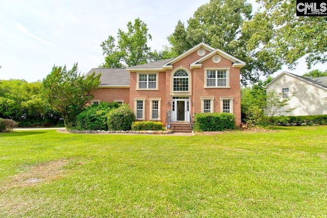 115 Chestnut Woods Ln, Columbia, SC 29212 - colonial-style house with a front yard and brick siding