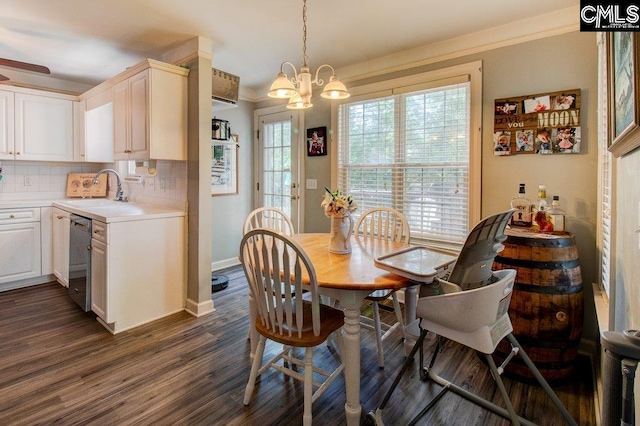 115 Chestnut Woods Ln, Columbia, SC 29212 - dining area featuring dark wood-type flooring, baseboards, crown molding, and a chandelier