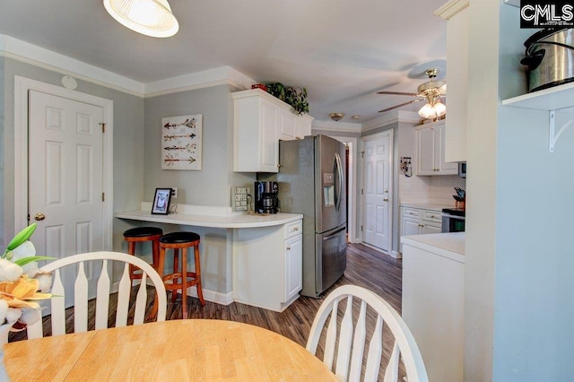 115 Chestnut Woods Ln, Columbia, SC 29212 - kitchen with stainless steel refrigerator with ice dispenser, white cabinetry, dark wood finished floors, ceiling fan, and light countertops