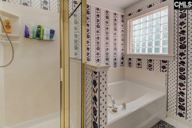 115 Chestnut Woods Ln, Columbia, SC 29212 - full bath with wallpapered walls, a stall shower, and a bath