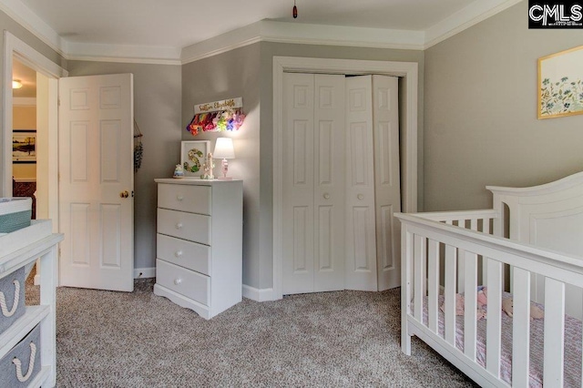 115 Chestnut Woods Ln, Columbia, SC 29212 - bedroom featuring carpet flooring, a closet, ornamental molding, and a crib