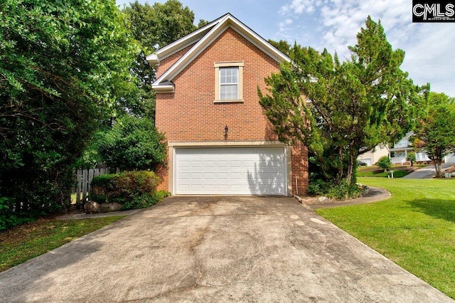 115 Chestnut Woods Ln, Columbia, SC 29212 - view of front of house with brick siding, a front yard, an attached garage, and concrete driveway