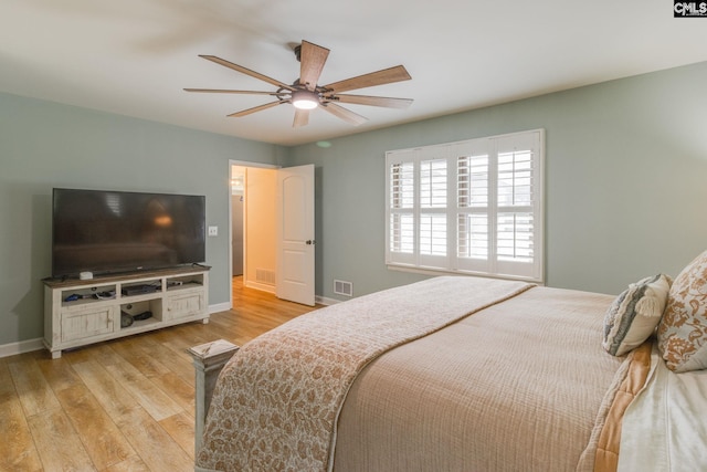 216 Jacobs Mill Pond Rd, Elgin, SC 29045 - bedroom featuring baseboards, light wood-type flooring, and ceiling fan