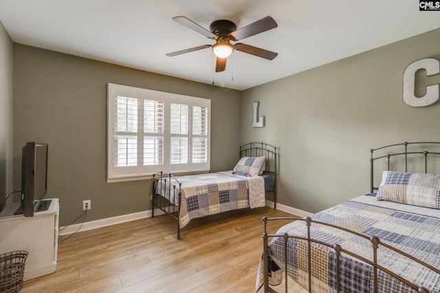 216 Jacobs Mill Pond Rd, Elgin, SC 29045 - bedroom with light wood-style floors, baseboards, and a ceiling fan
