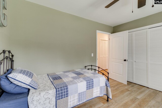 216 Jacobs Mill Pond Rd, Elgin, SC 29045 - bedroom with light wood-style floors, a closet, and a ceiling fan