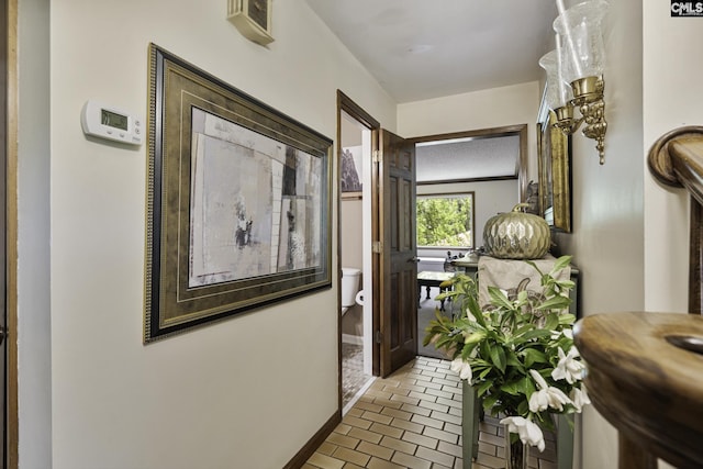 111 Rusty Barn Rd, Columbia, SC 29212 - hall featuring brick flooring and baseboards