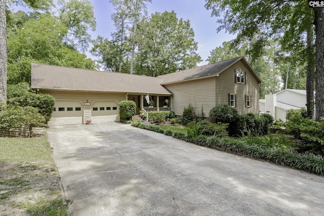 111 Rusty Barn Rd, Columbia, SC 29212 - view of front of property with an attached garage, a porch, and concrete driveway