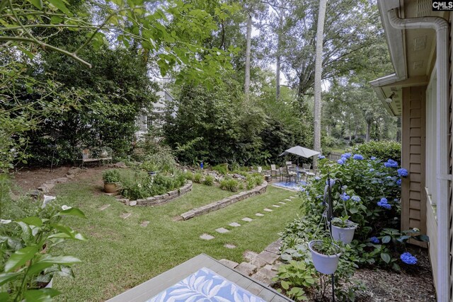 111 Rusty Barn Rd, Columbia, SC 29212 - view of grassy yard featuring a patio and view of wooded area