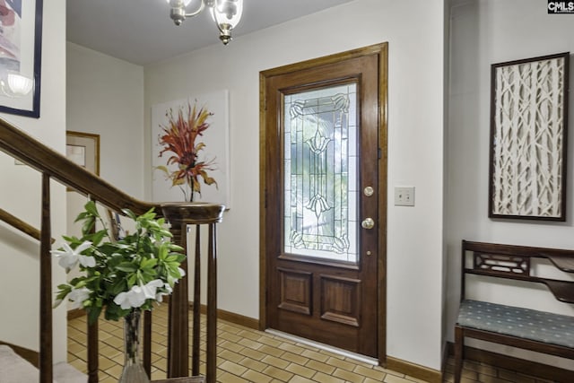 111 Rusty Barn Rd, Columbia, SC 29212 - foyer featuring baseboards, stairway, and a chandelier