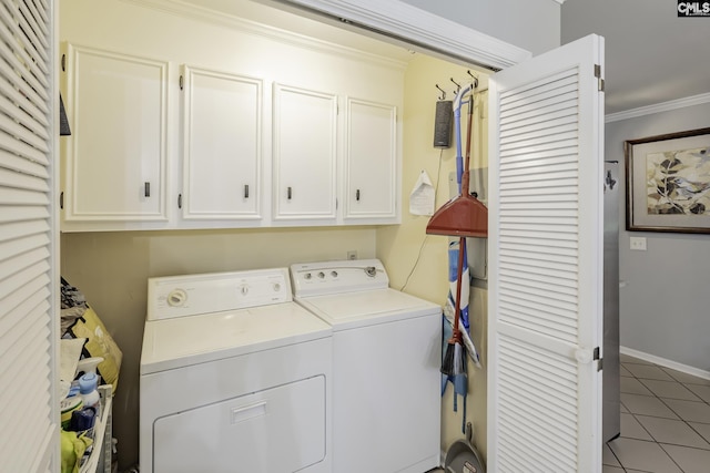 111 Rusty Barn Rd, Columbia, SC 29212 - laundry area featuring cabinet space, washing machine and dryer, ornamental molding, tile patterned floors, and baseboards