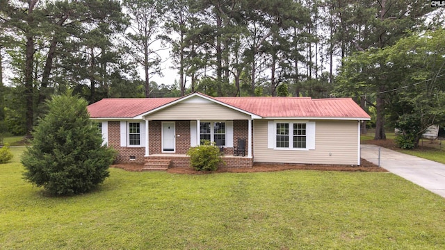 137 Wingate St, Darlington, SC 29532 - ranch-style house with a front yard, metal roof, brick siding, crawl space, and a porch