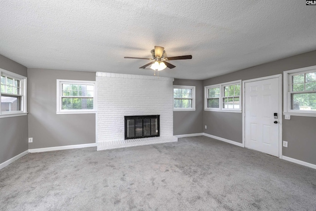 137 Wingate St, Darlington, SC 29532 - unfurnished living room with ceiling fan, plenty of natural light, a textured ceiling, and carpet