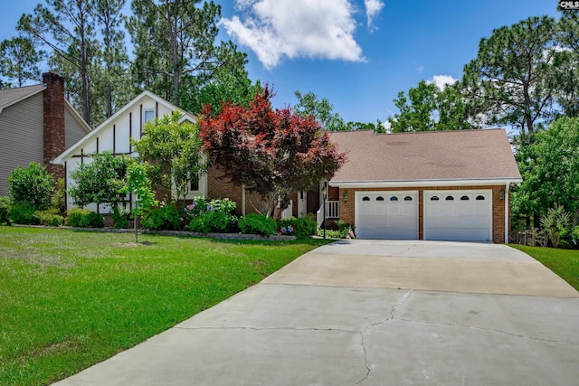 800 Wotan Rd, Columbia, SC 29229 - view of front of home with brick siding, driveway, a front lawn, and a garage