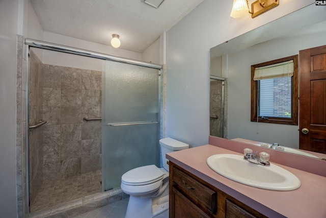 800 Wotan Rd, Columbia, SC 29229 - bathroom with toilet, a shower stall, vanity, tile patterned floors, and a textured ceiling