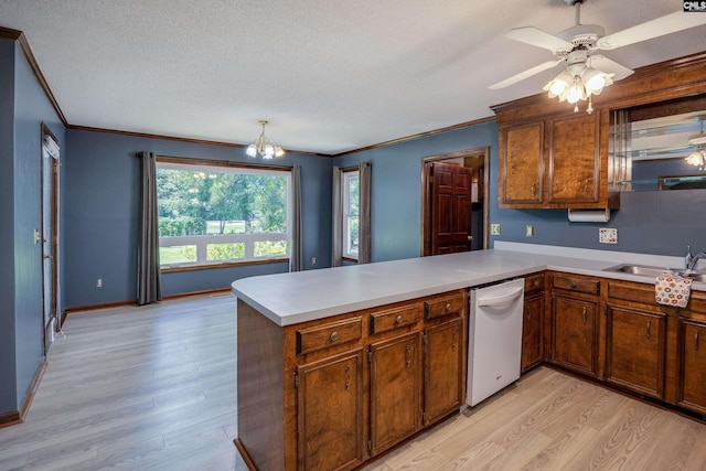800 Wotan Rd, Columbia, SC 29229 - kitchen with dishwasher, ornamental molding, a sink, light wood finished floors, and a textured ceiling