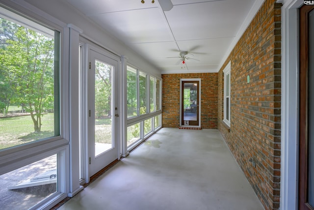800 Wotan Rd, Columbia, SC 29229 - unfurnished sunroom featuring brick wall, concrete floors, and healthy amount of natural light