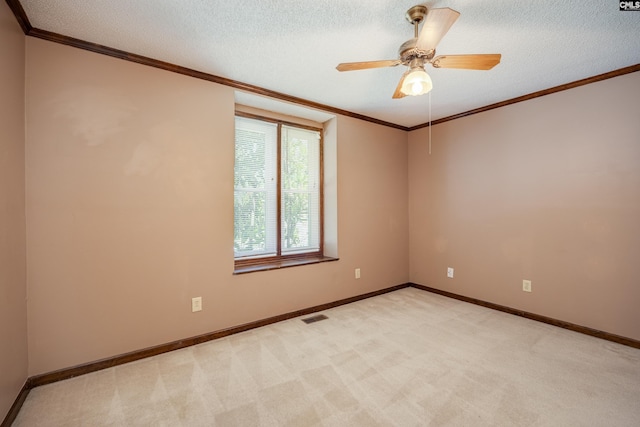 800 Wotan Rd, Columbia, SC 29229 - empty room with light colored carpet, ornamental molding, a ceiling fan, a textured ceiling, and baseboards