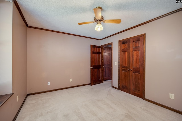 800 Wotan Rd, Columbia, SC 29229 - unfurnished bedroom featuring light colored carpet, crown molding, baseboards, ceiling fan, and a textured ceiling