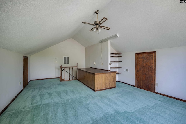 800 Wotan Rd, Columbia, SC 29229 - bonus room with vaulted ceiling, a ceiling fan, light carpet, a textured ceiling, and baseboards