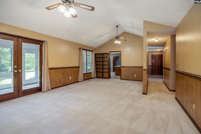 800 Wotan Rd, Columbia, SC 29229 - empty room with wainscoting, wooden walls, a ceiling fan, vaulted ceiling, and light colored carpet
