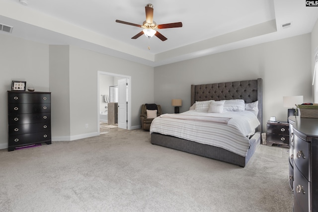 309 Springbrook Way, Chapin, SC 29036 - bedroom featuring a tray ceiling, light colored carpet, baseboards, and a ceiling fan