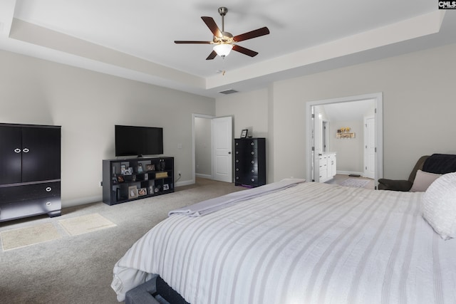 309 Springbrook Way, Chapin, SC 29036 - bedroom with light carpet, a tray ceiling, baseboards, and ceiling fan